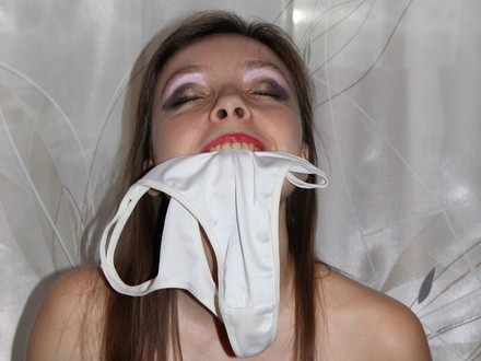 Kinky stepsister in fishnets uses a toy